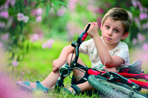 Boy and bicycle.