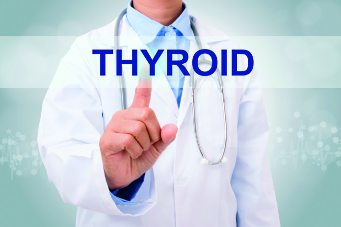 Doctor hand touching THYROID sign on virtual screen. medical con